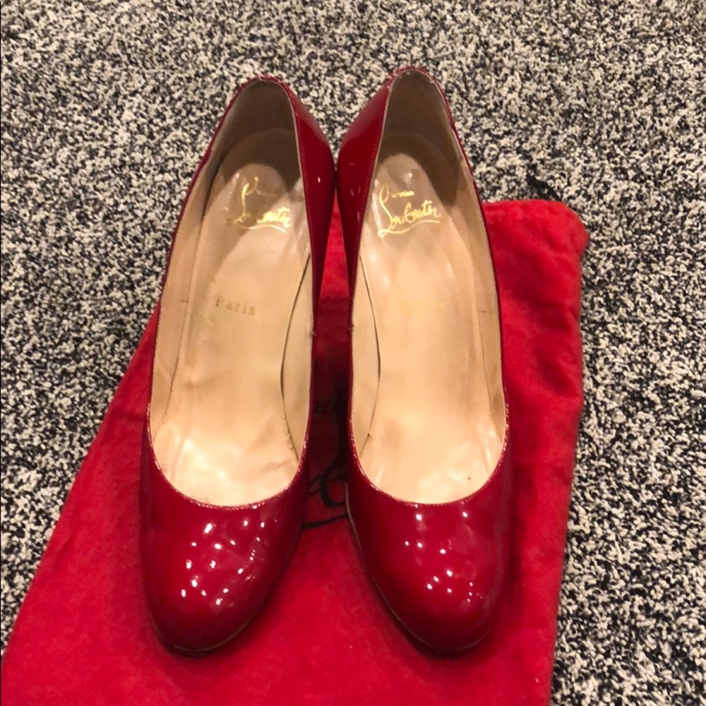 Christian Louboutin red patent wedges